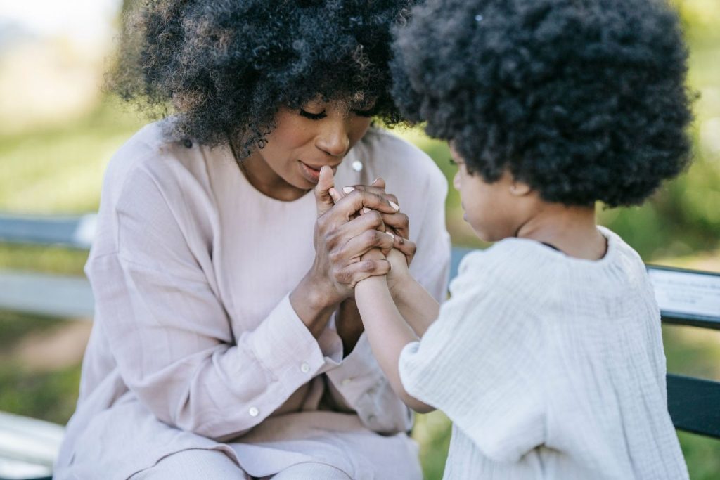 A mother together with her child.